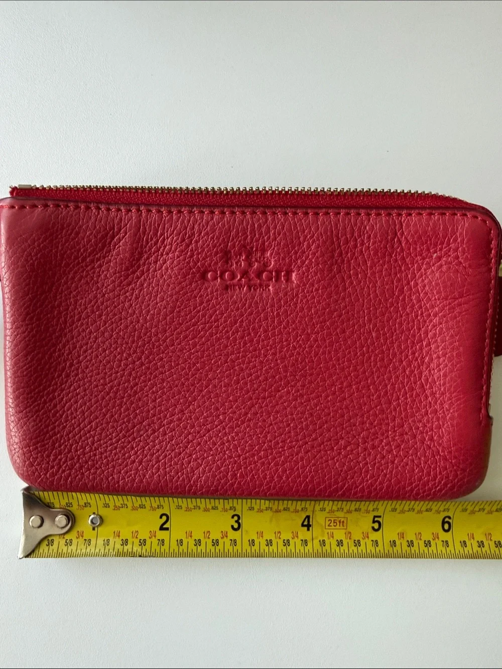 Coach compact pebbled